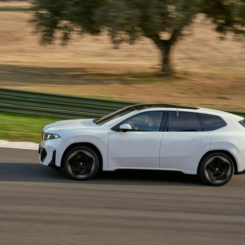 2026 BMW iX3 50 xDrive NA5 Alpine White Side View