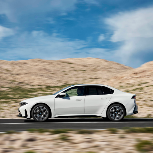 2027 BMW i3 50 xDrive NA0 Alpine White Side View