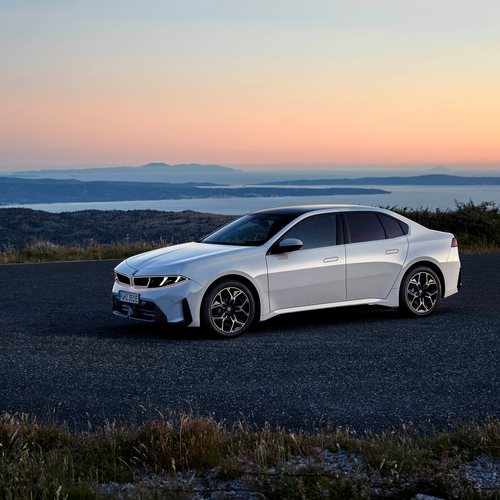 2027 BMW i3 50 xDrive NA0 Alpine White Side View