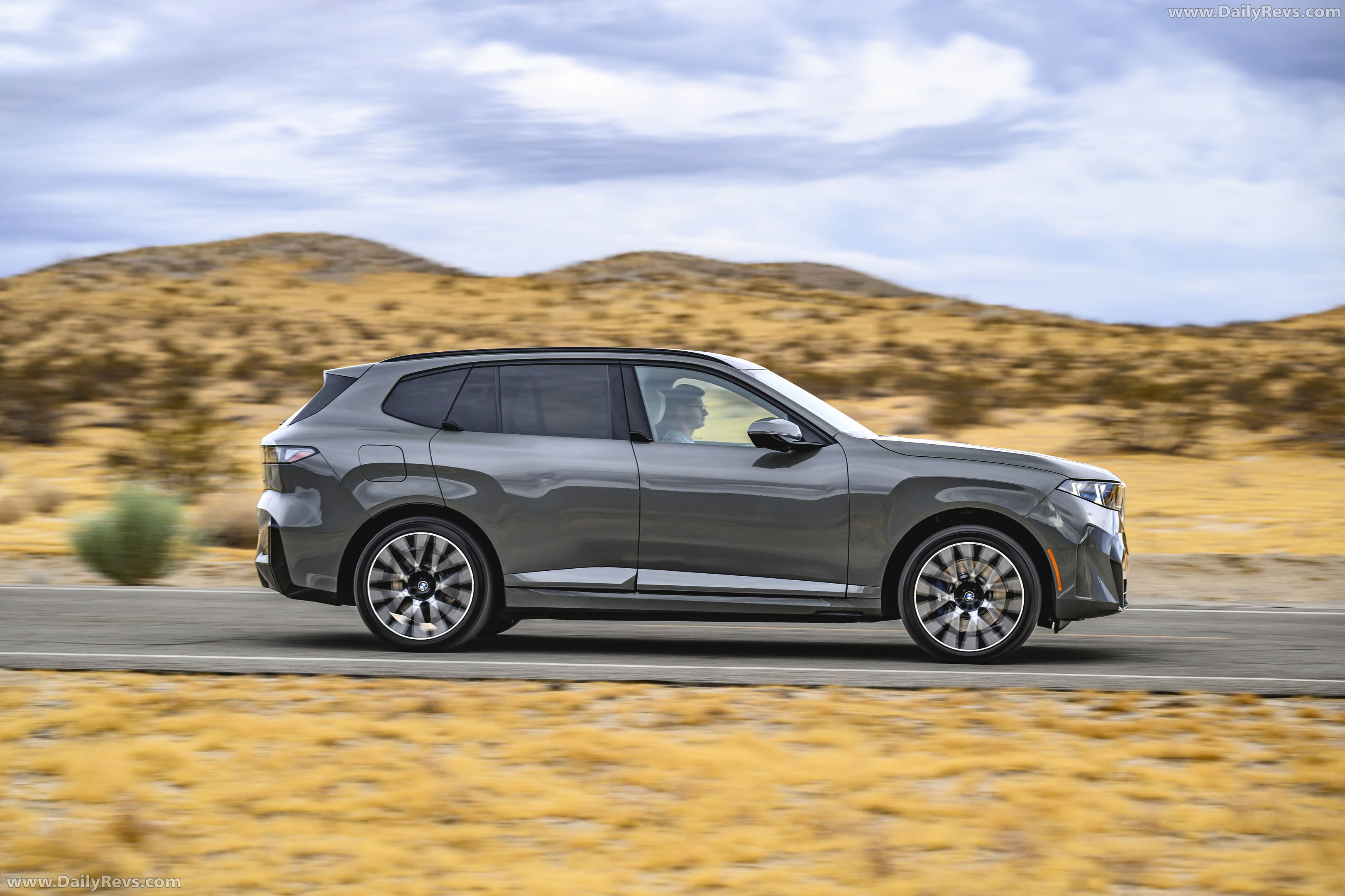 2027 BMW iX5 60 xDrive G65 Pine Grey Side View