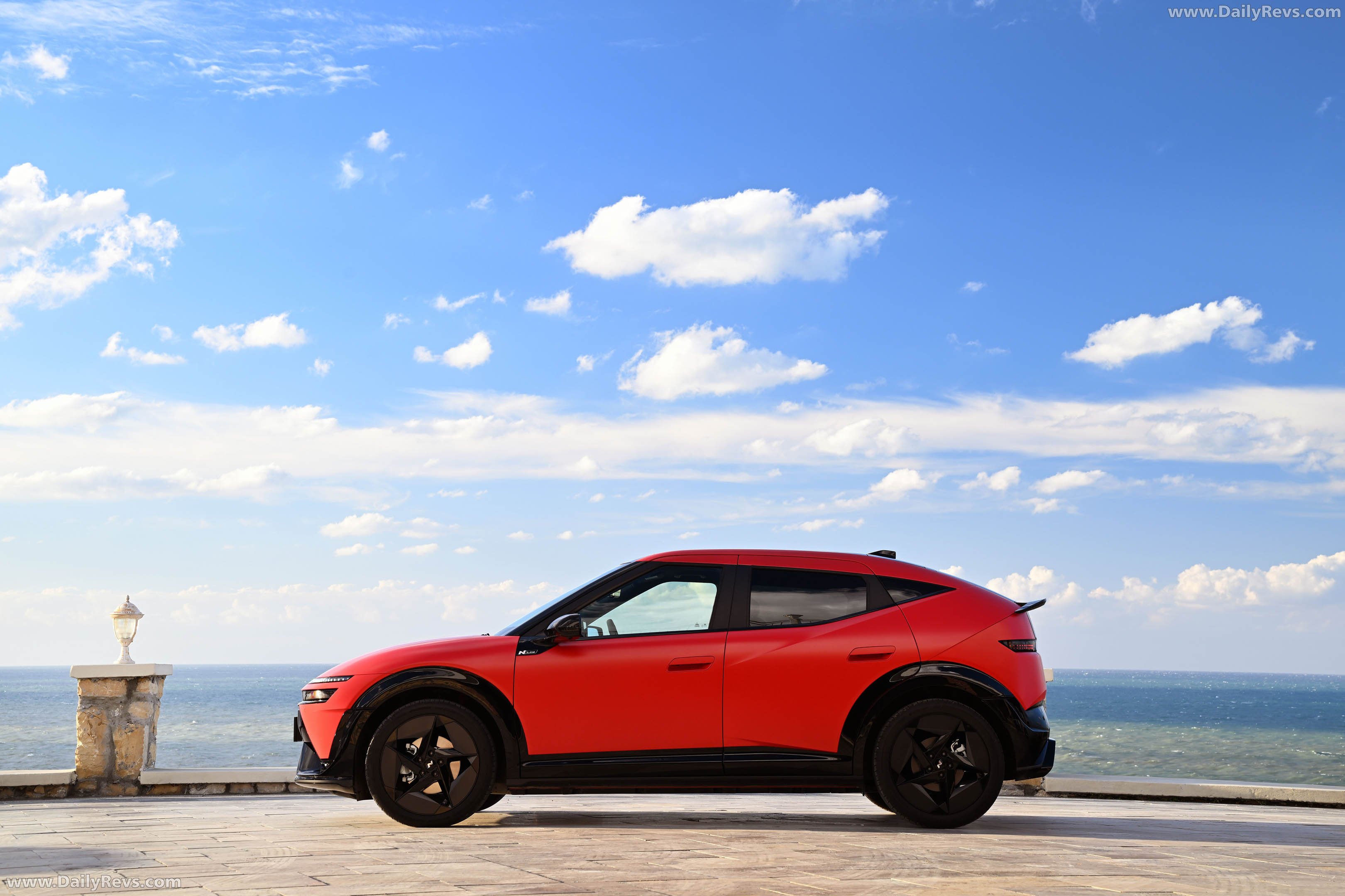 2027 Hyundai IONIQ 3 Fierce Red Matte Side View