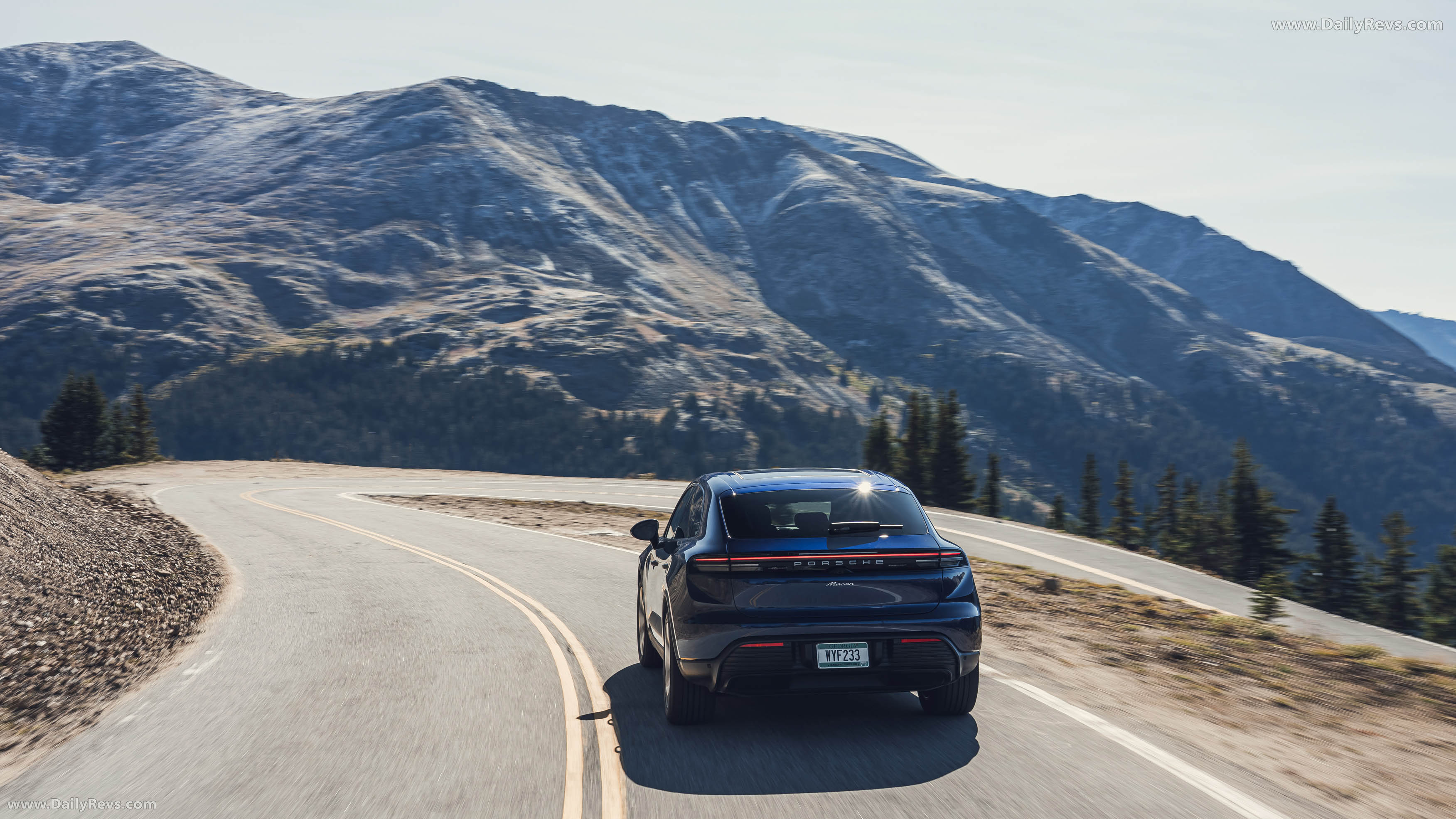 2025 Porsche Macan Gentian Blue H2 Rear View