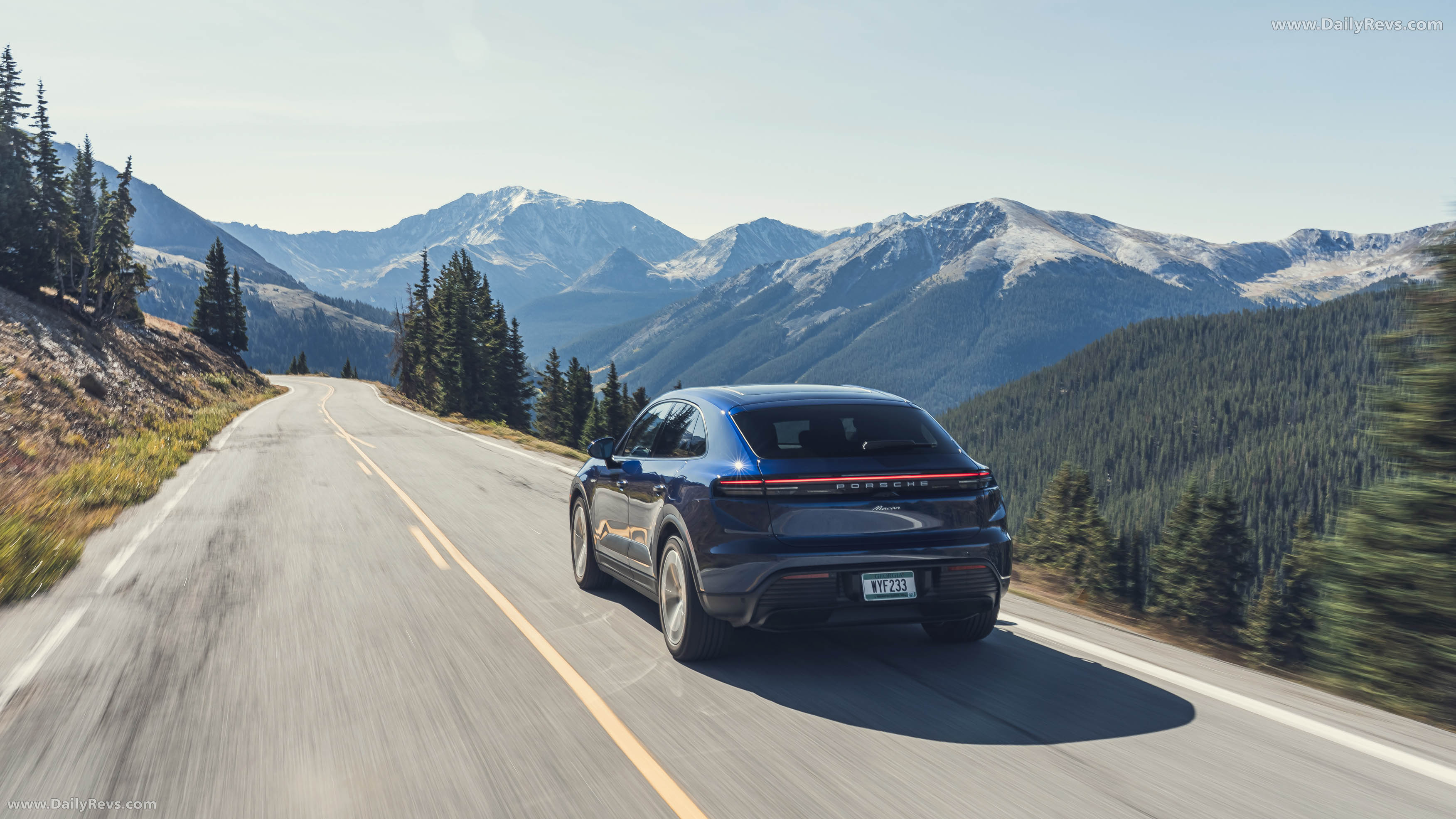 2025 Porsche Macan Gentian Blue H2 Rear View