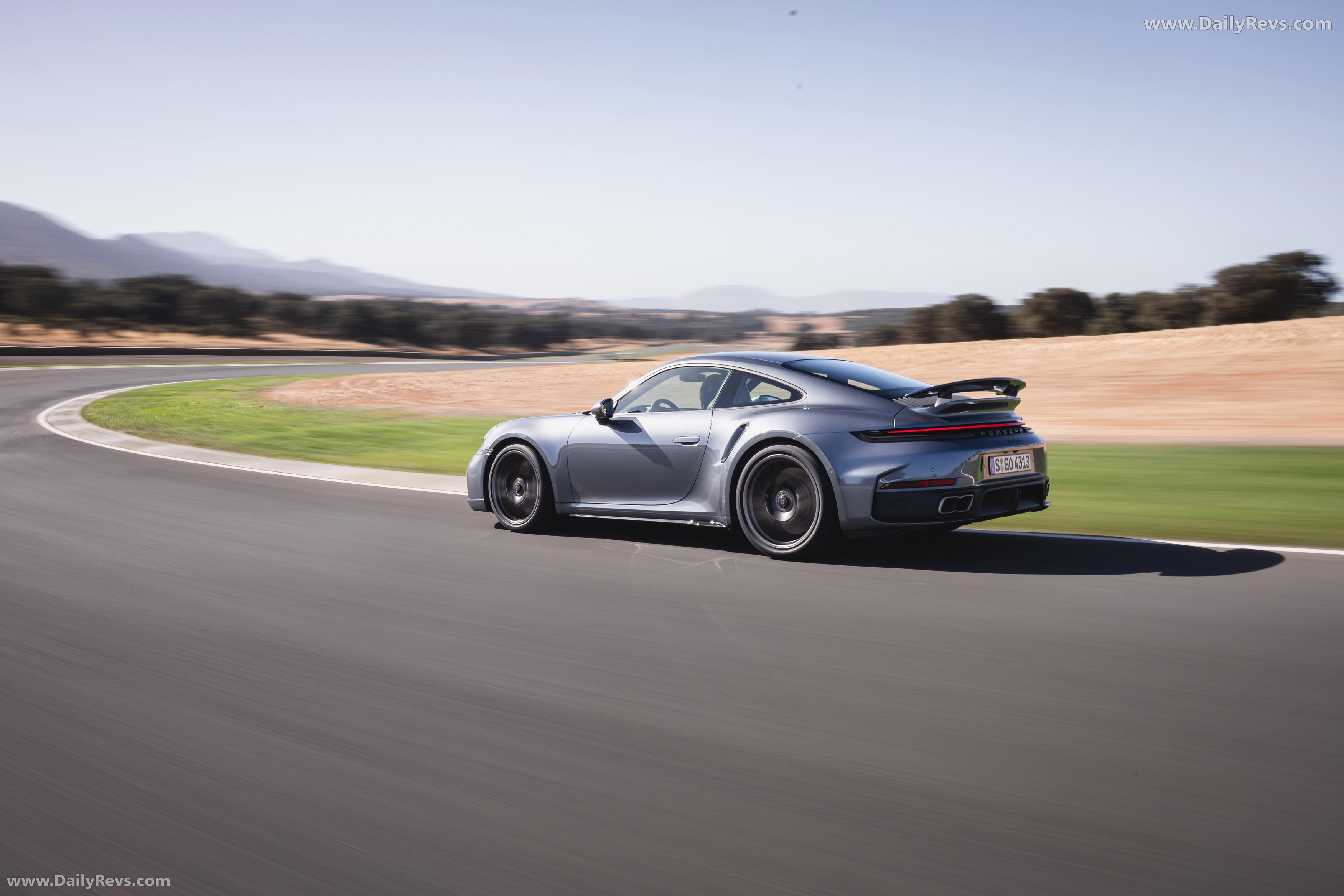 2026 Porsche 911 Turbo S 992 ll Vanadium Grey Rear View
