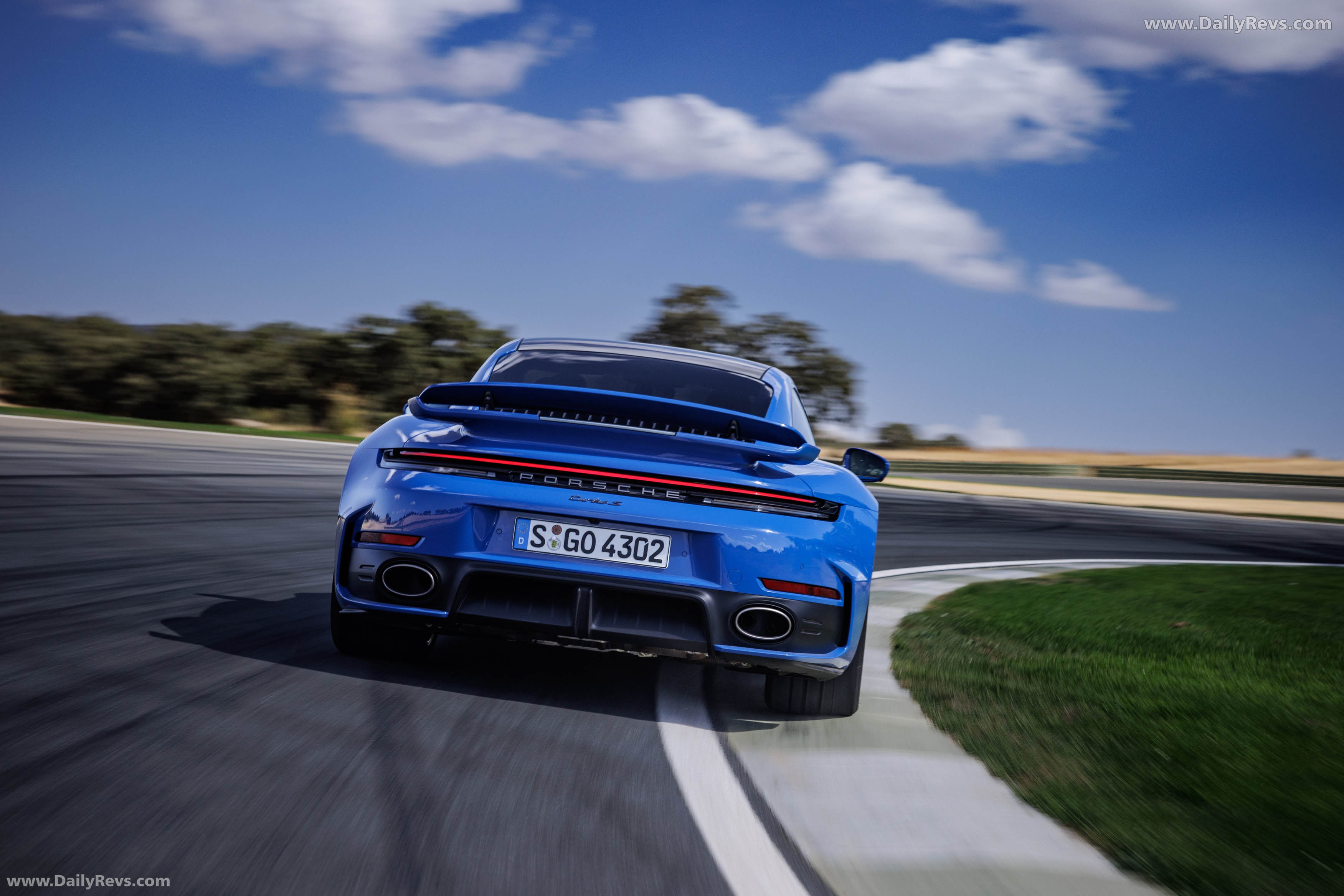 2026 Porsche 911 Turbo S 992 ll Lugano Blue Rear View