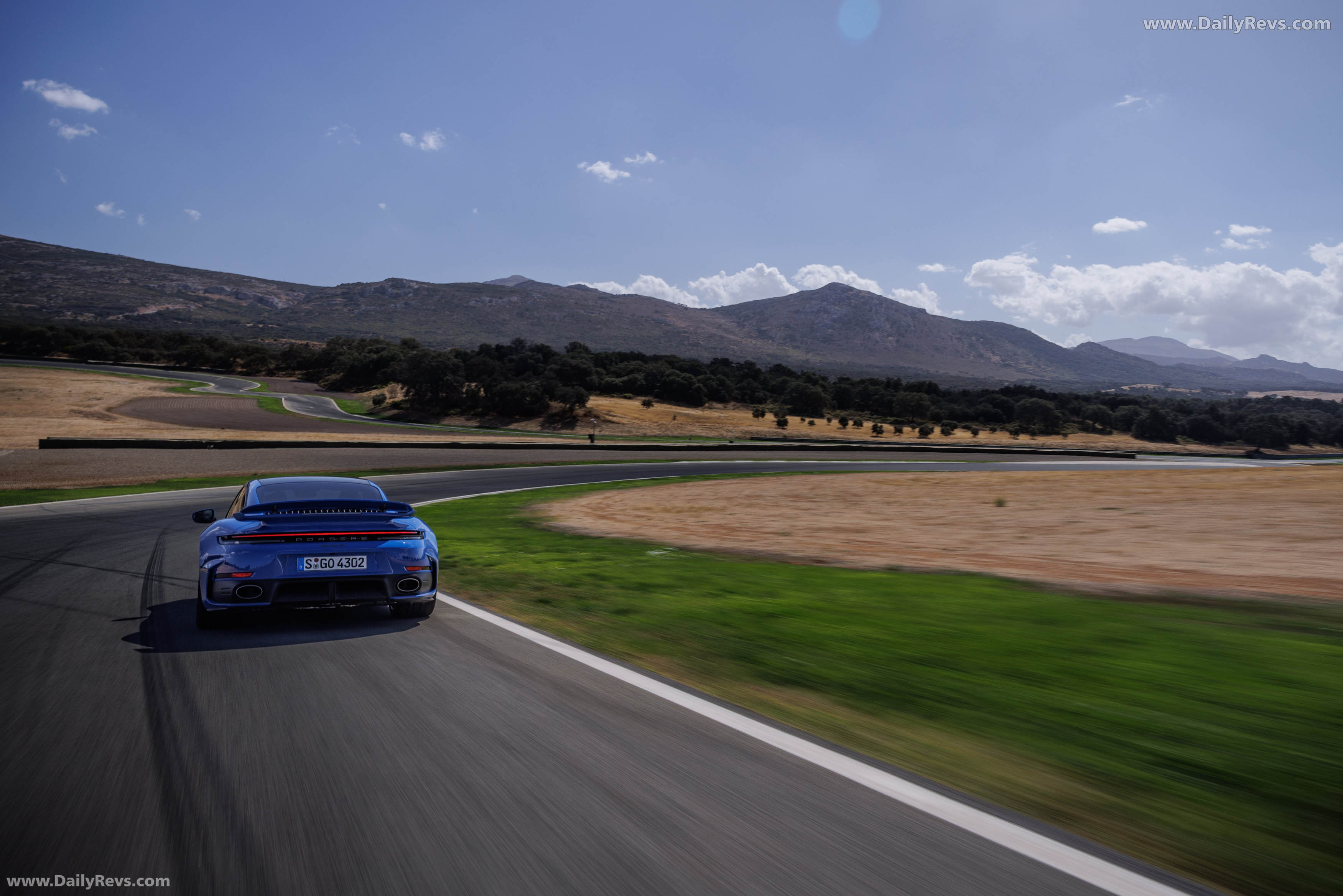 2026 Porsche 911 Turbo S 992 ll Lugano Blue Rear View