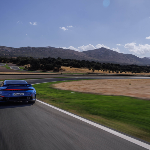 2026 Porsche 911 Turbo S 992 ll Lugano Blue Rear View