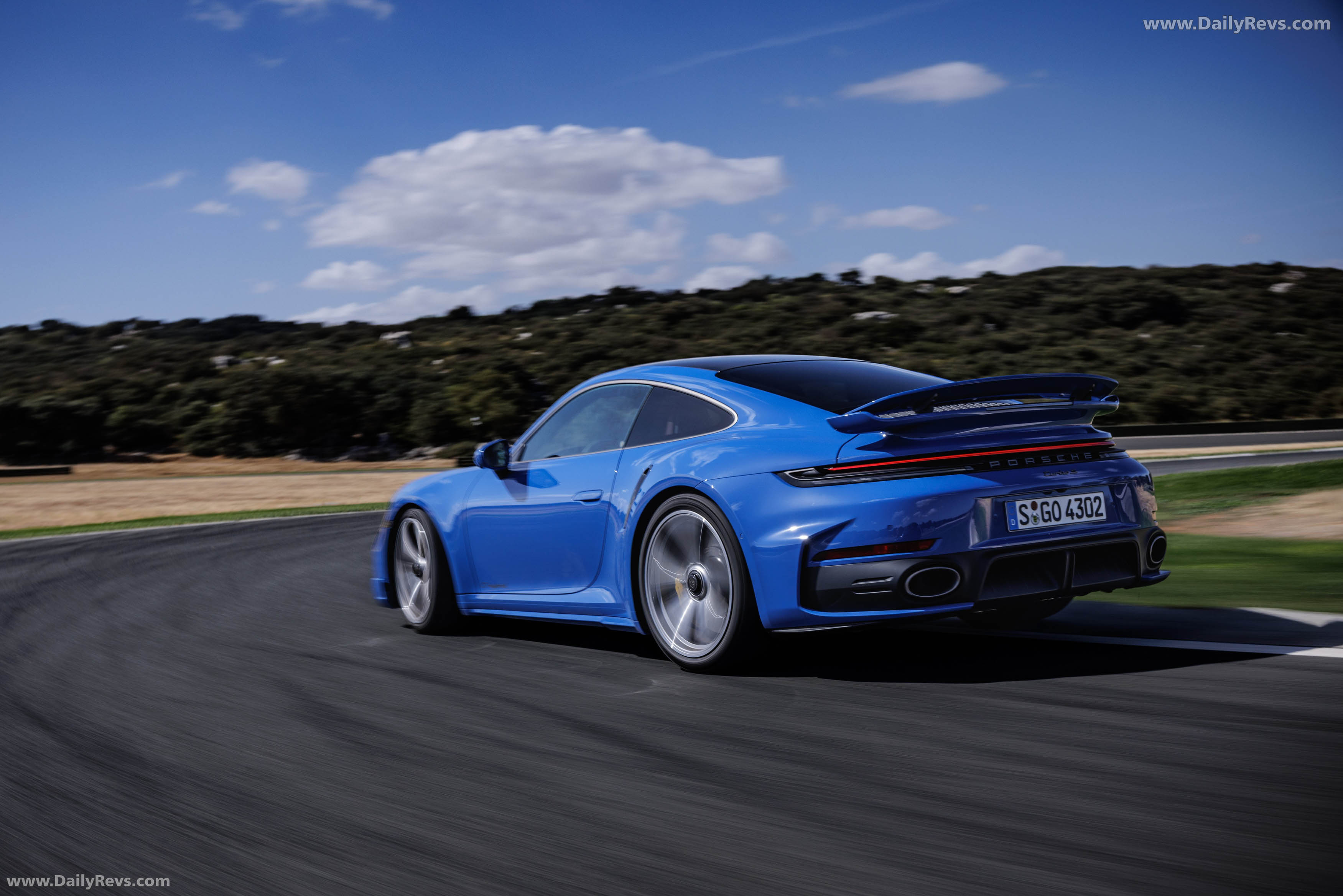 2026 Porsche 911 Turbo S 992 ll Lugano Blue Rear View