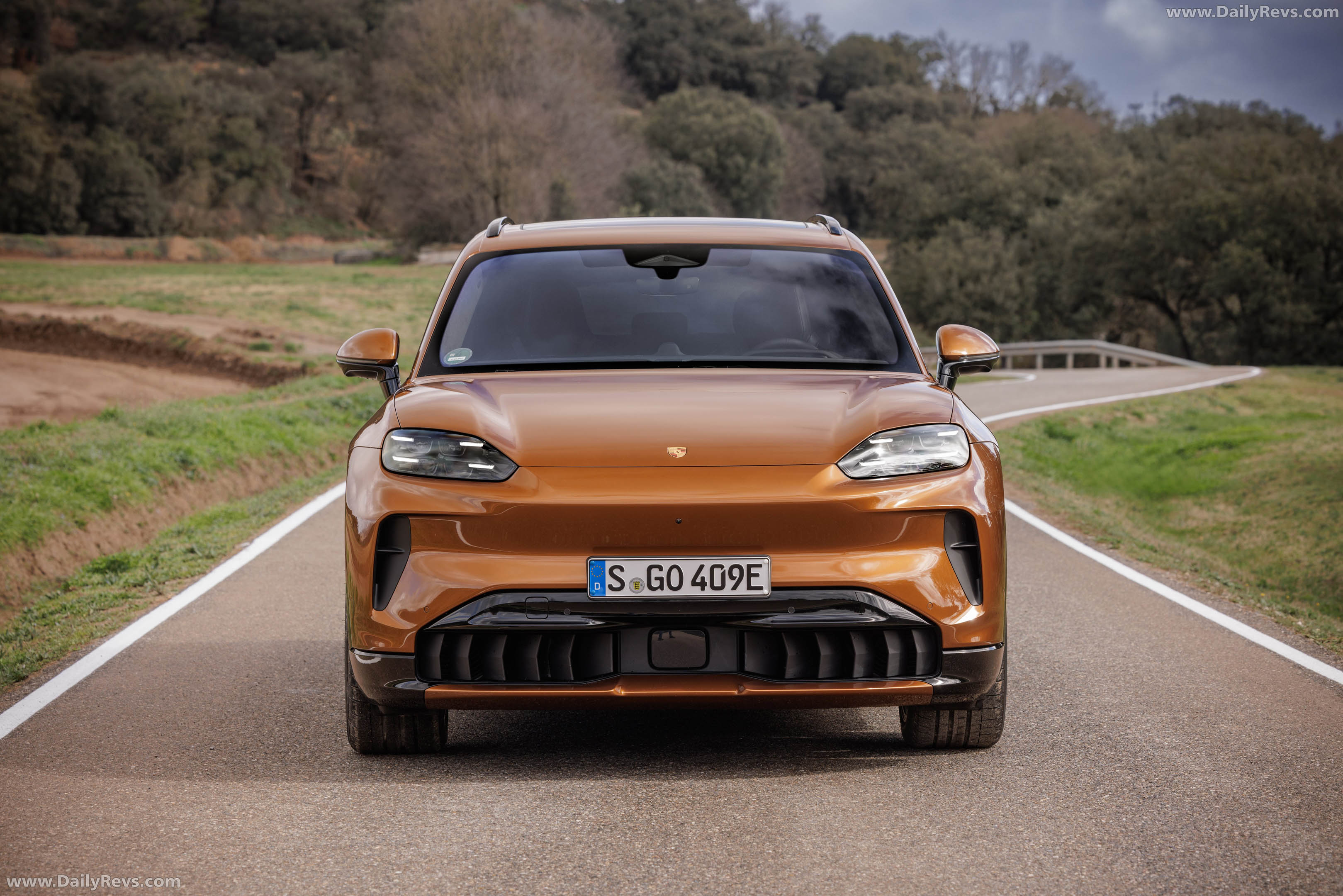 2027 Porsche Cayenne Electric E4 Madeira Gold Front View