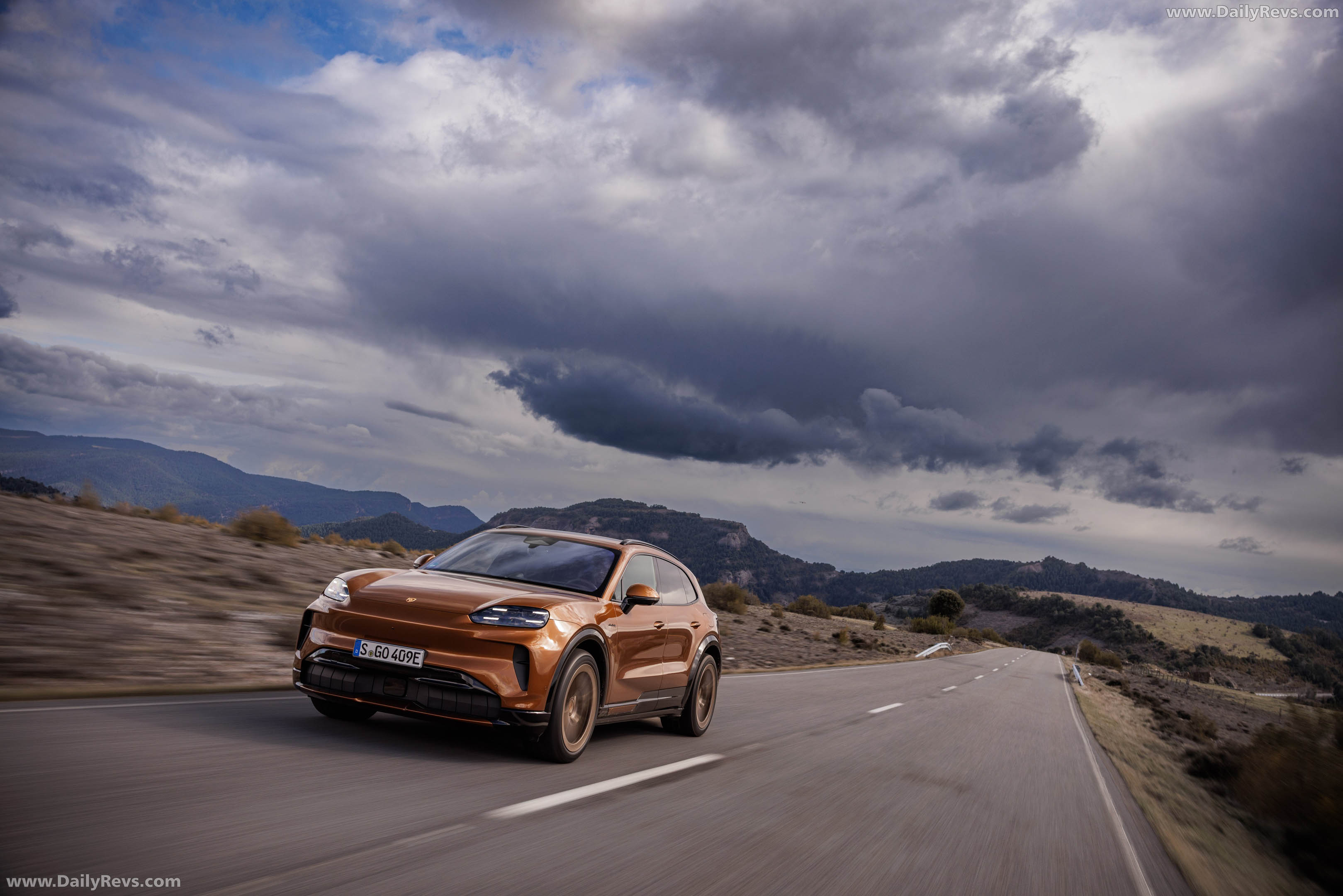2027 Porsche Cayenne Electric E4 Madeira Gold Front View