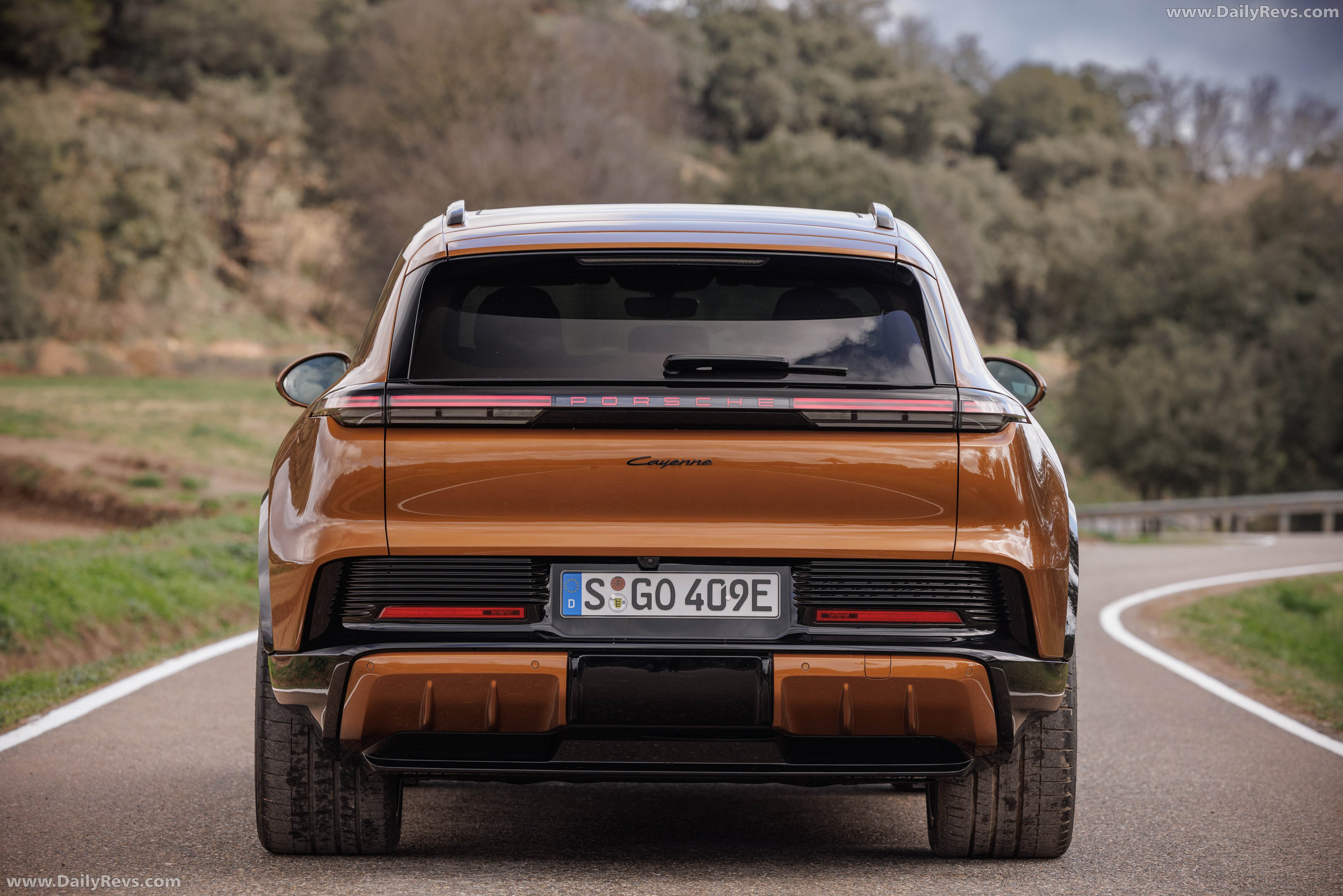 2027 Porsche Cayenne Electric E4 Madeira Gold Rear View