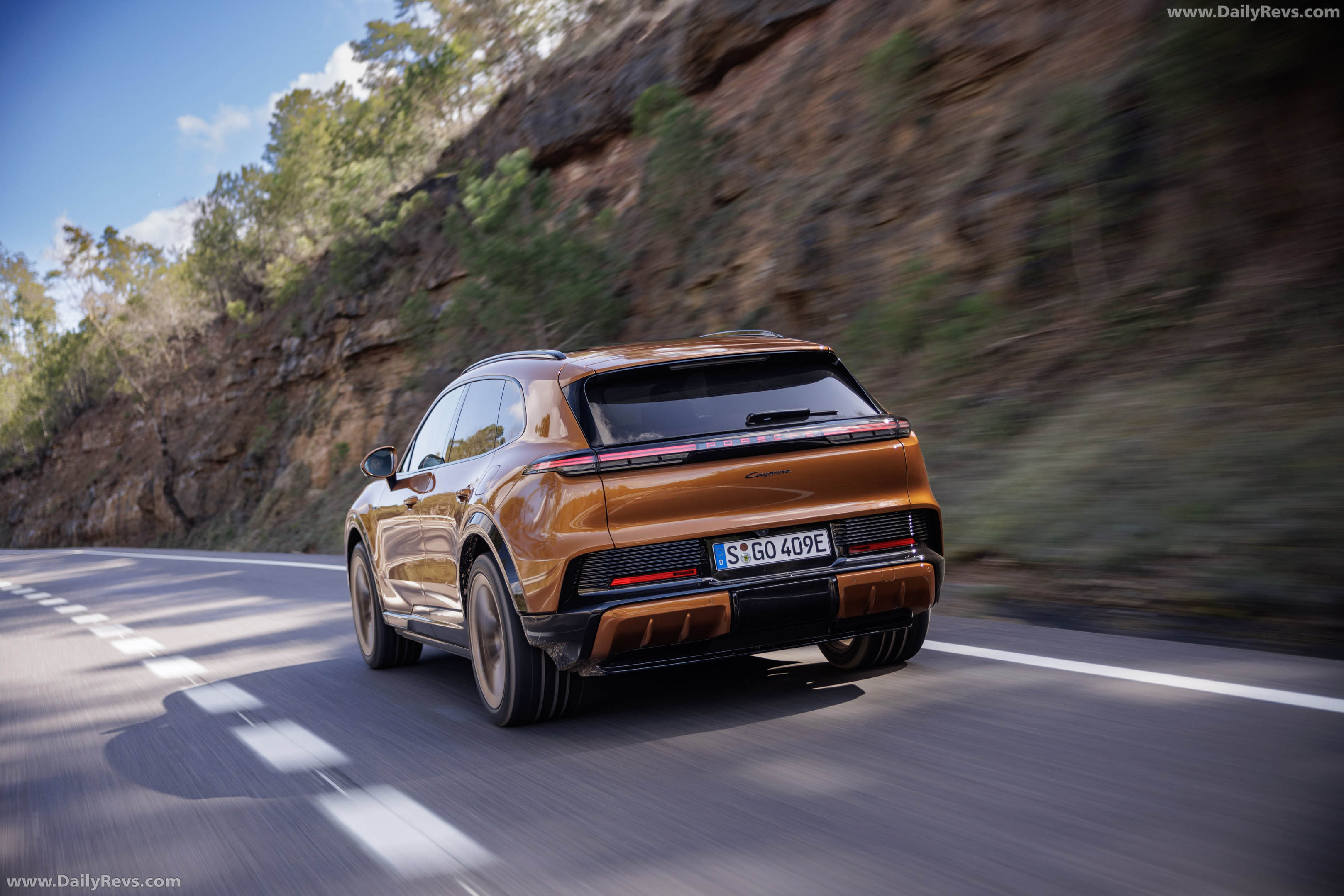 2027 Porsche Cayenne Electric E4 Madeira Gold Rear View