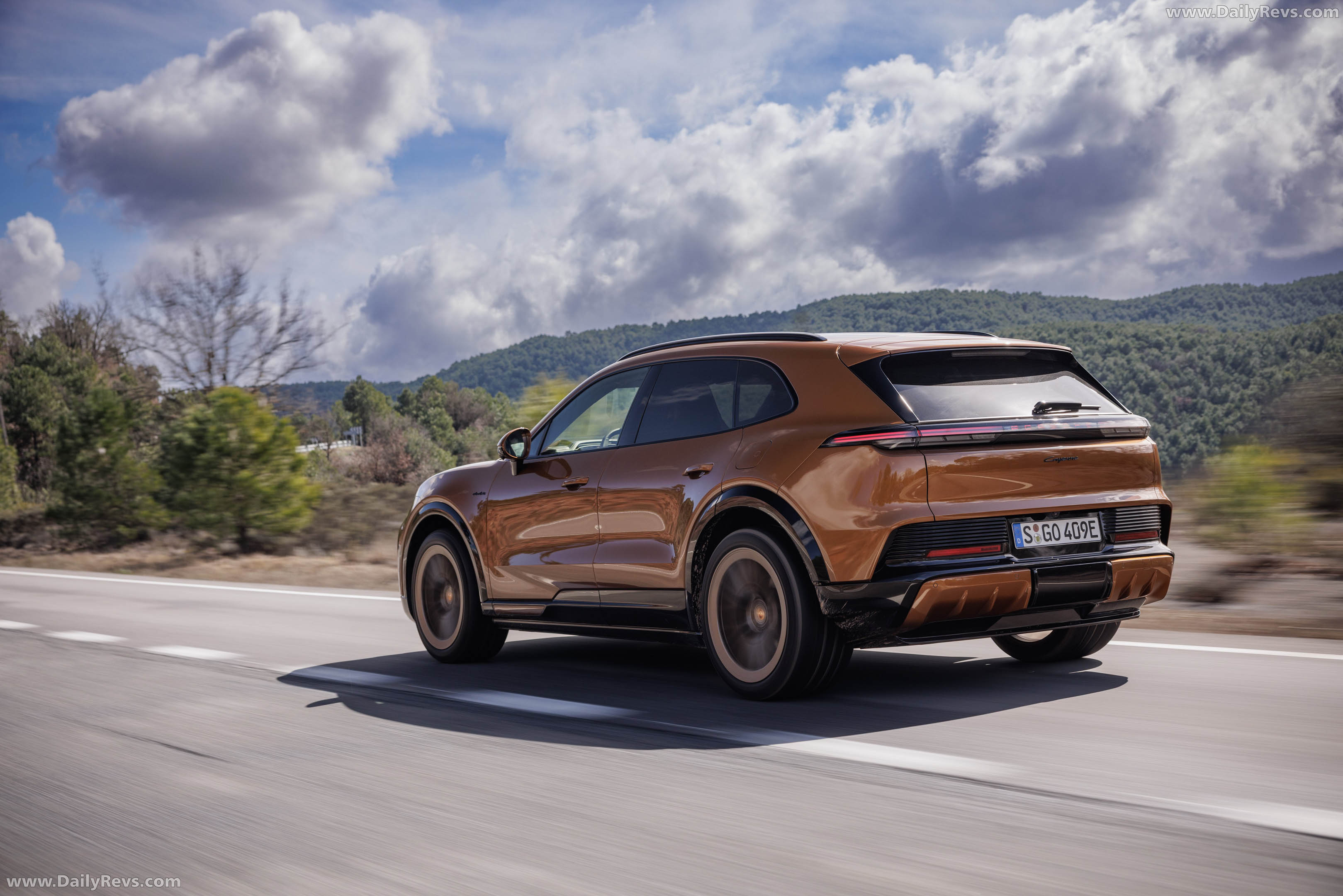2027 Porsche Cayenne Electric E4 Madeira Gold Rear View