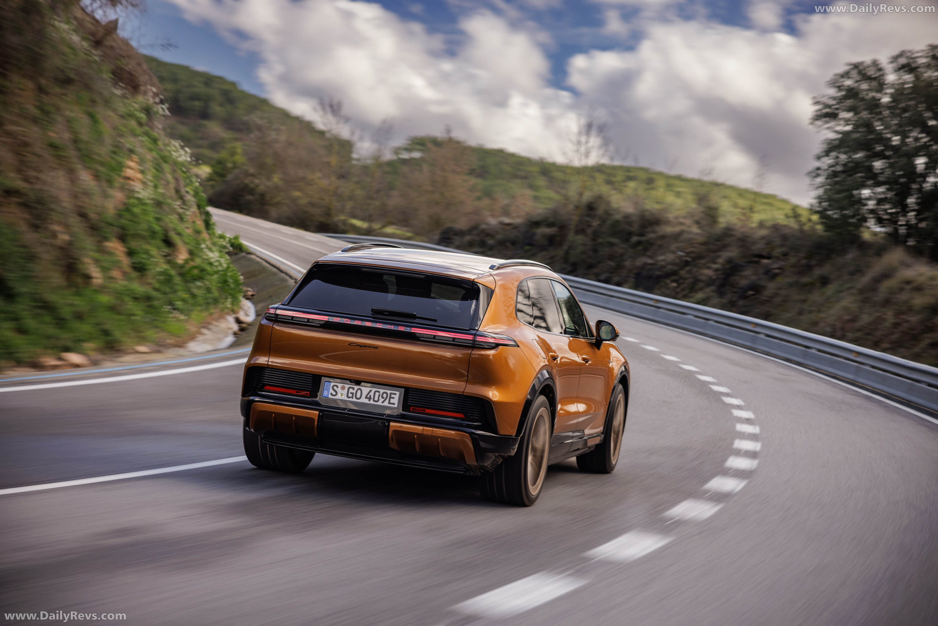 2027 Porsche Cayenne Electric E4 Madeira Gold Rear View