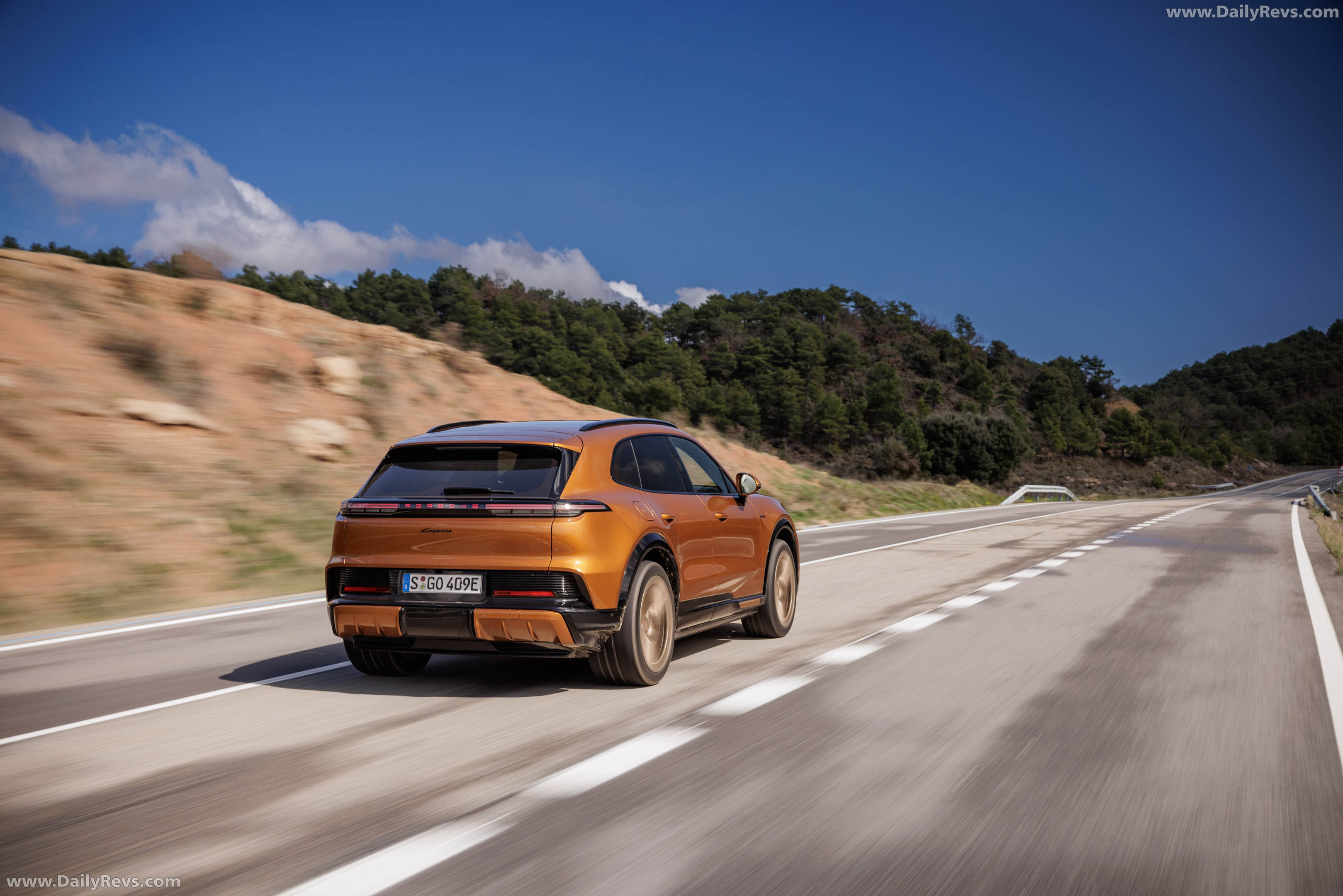 2027 Porsche Cayenne Electric E4 Madeira Gold Rear View