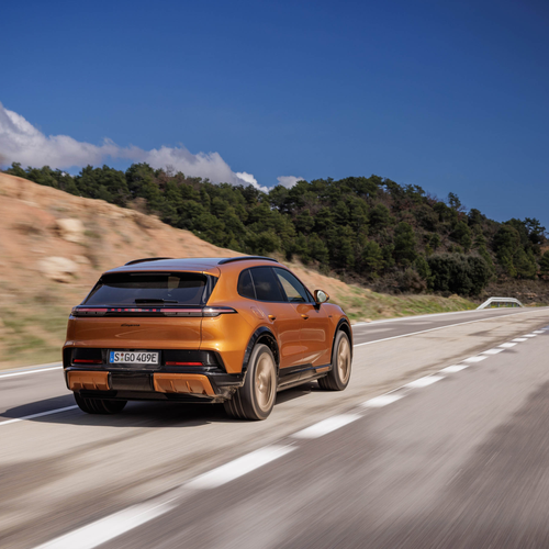 2027 Porsche Cayenne Electric E4 Madeira Gold Rear View