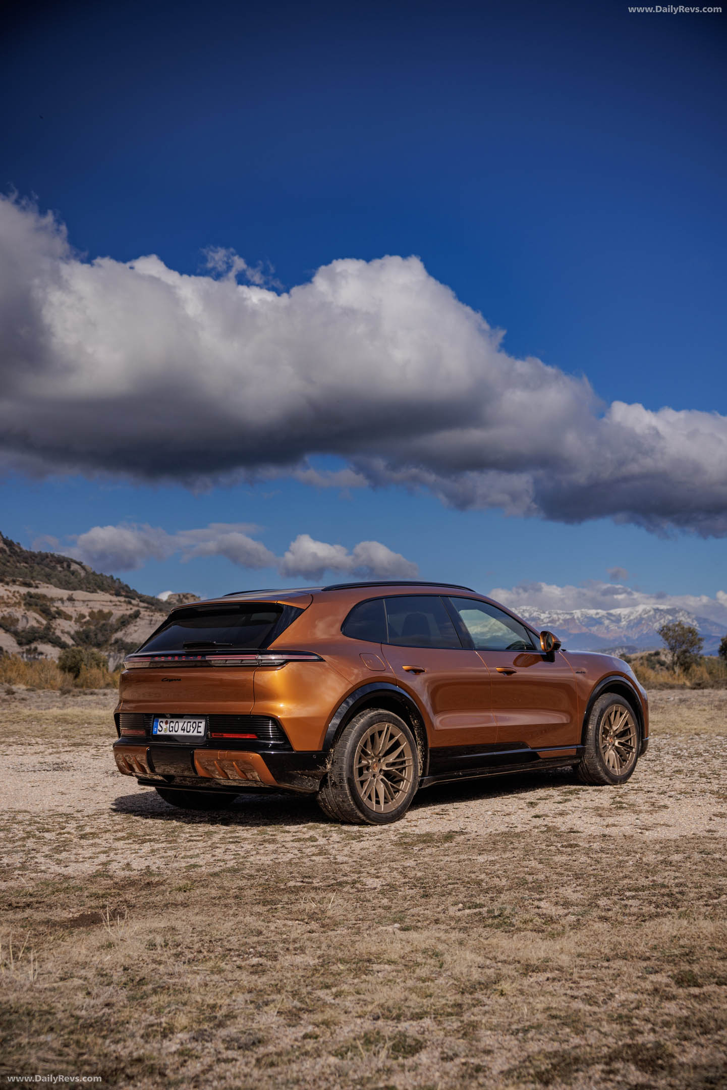 2027 Porsche Cayenne Electric E4 Madeira Gold Rear View