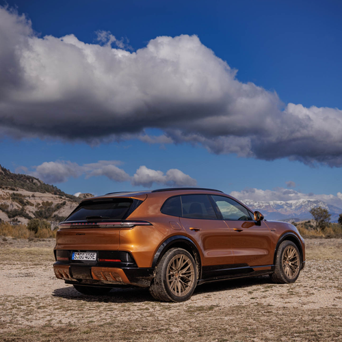 2027 Porsche Cayenne Electric E4 Madeira Gold Rear View