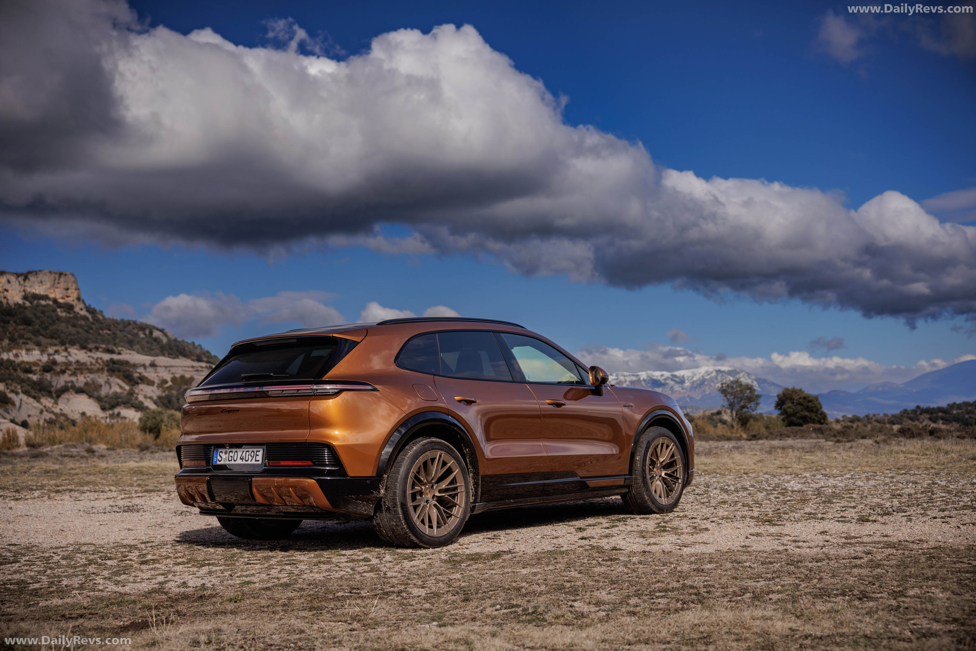 2027 Porsche Cayenne Electric E4 Madeira Gold Rear View