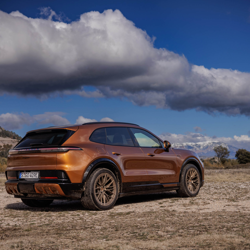2027 Porsche Cayenne Electric E4 Madeira Gold Rear View