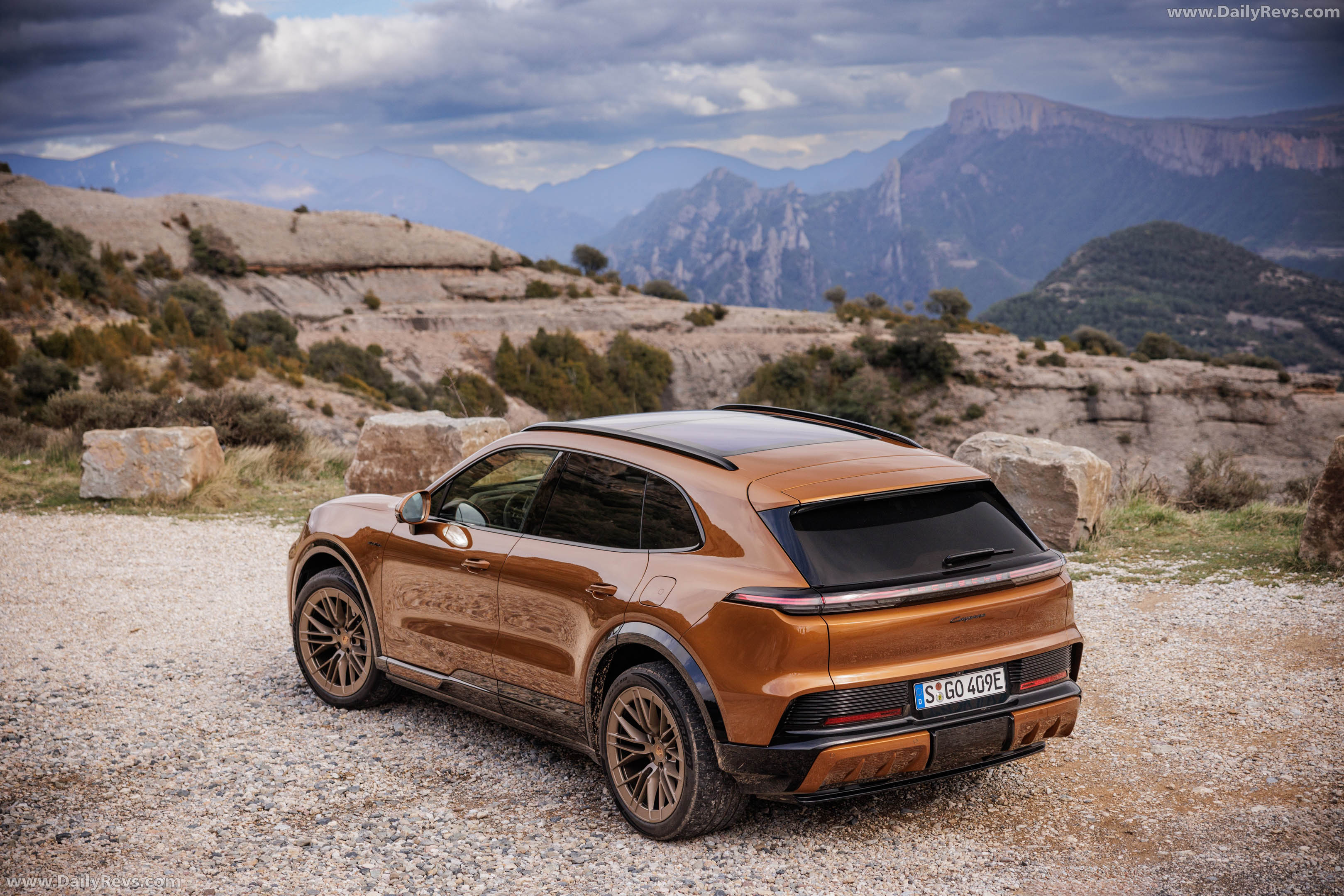 2027 Porsche Cayenne Electric E4 Madeira Gold Rear View
