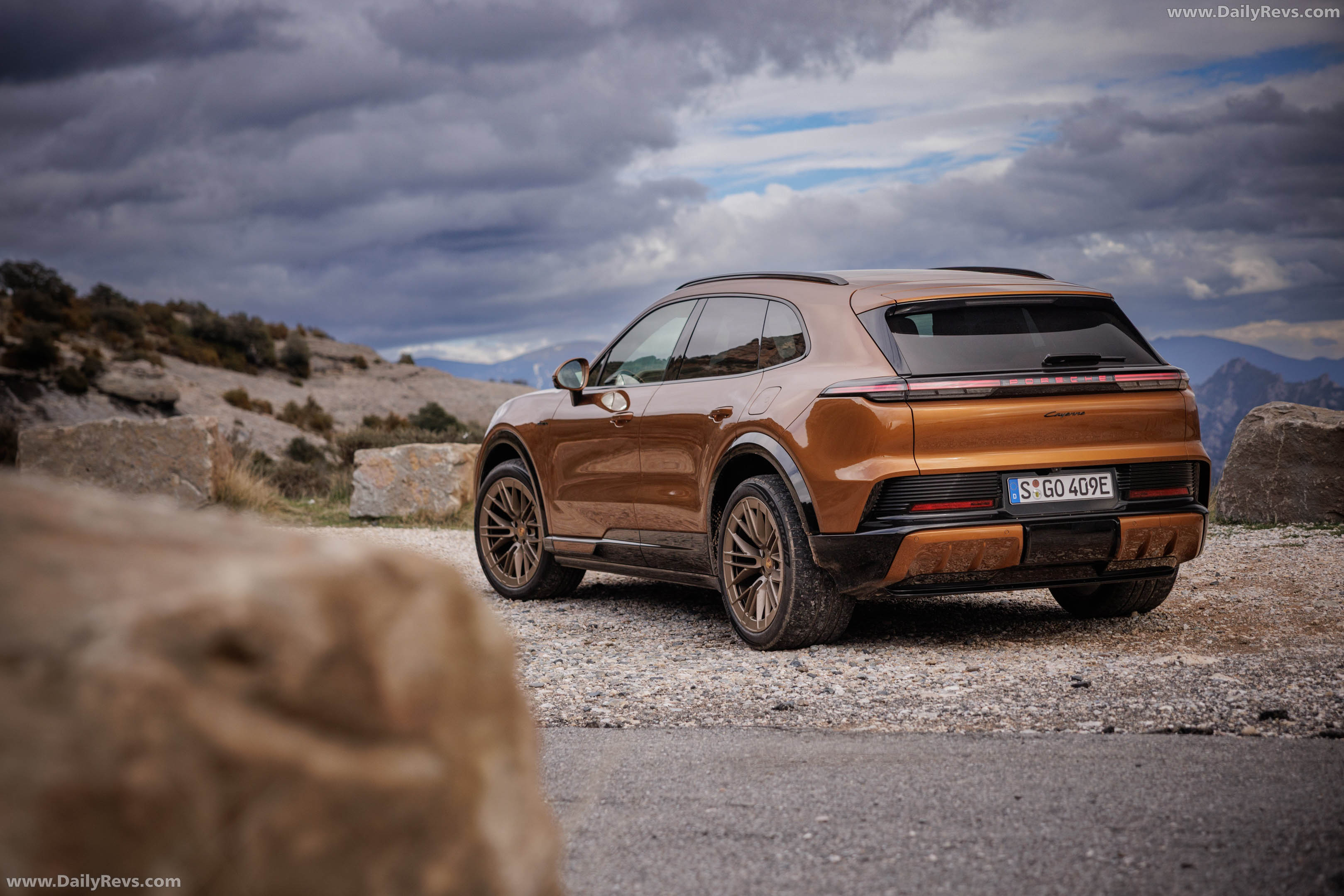 2027 Porsche Cayenne Electric E4 Madeira Gold Rear View