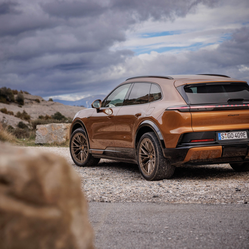 2027 Porsche Cayenne Electric E4 Madeira Gold Rear View