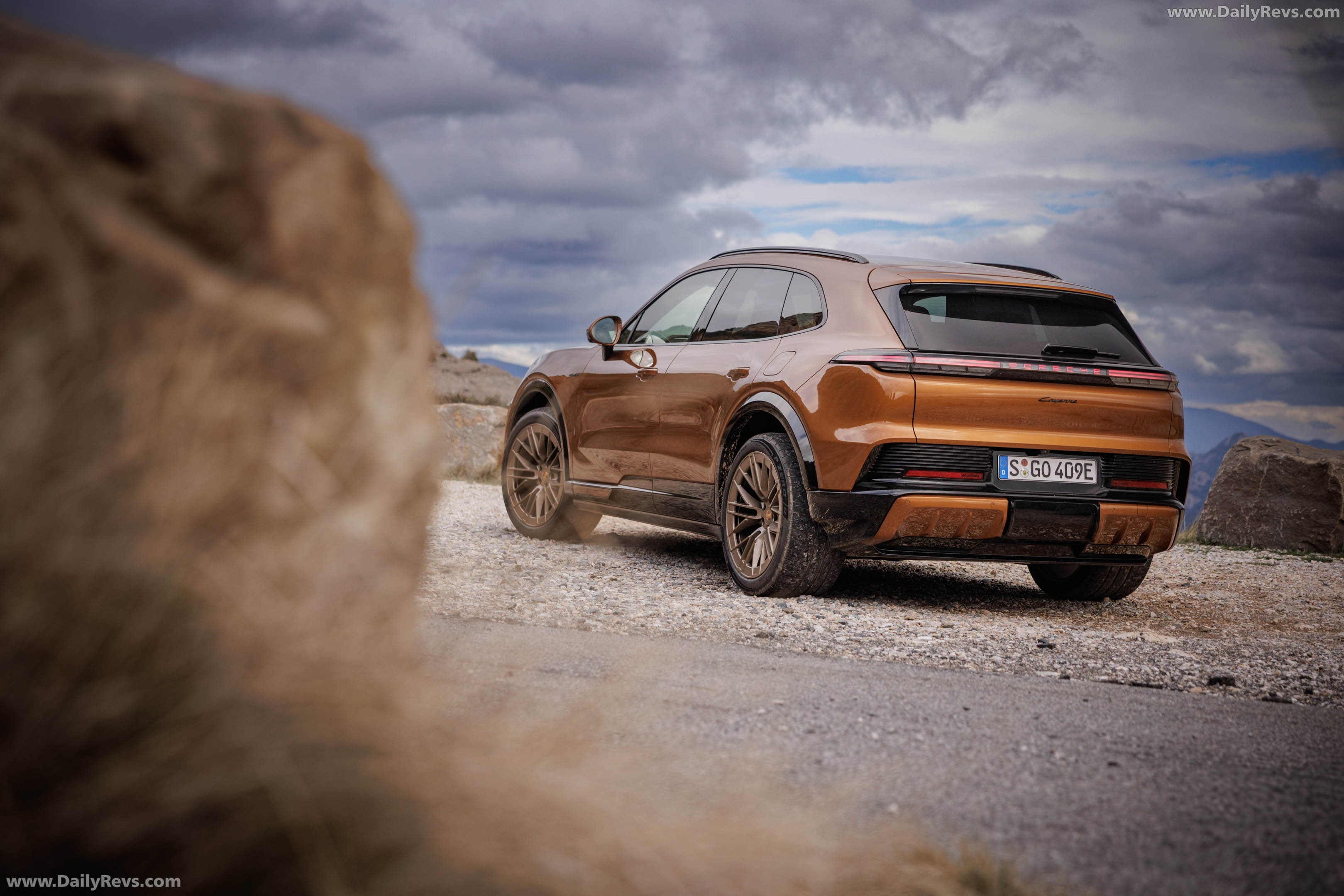 2027 Porsche Cayenne Electric E4 Madeira Gold Rear View