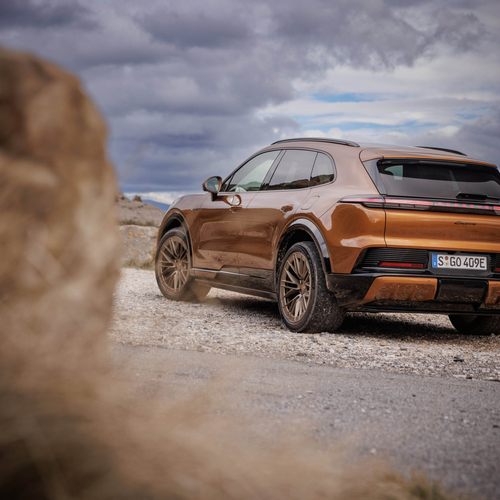 2027 Porsche Cayenne Electric E4 Madeira Gold Rear View