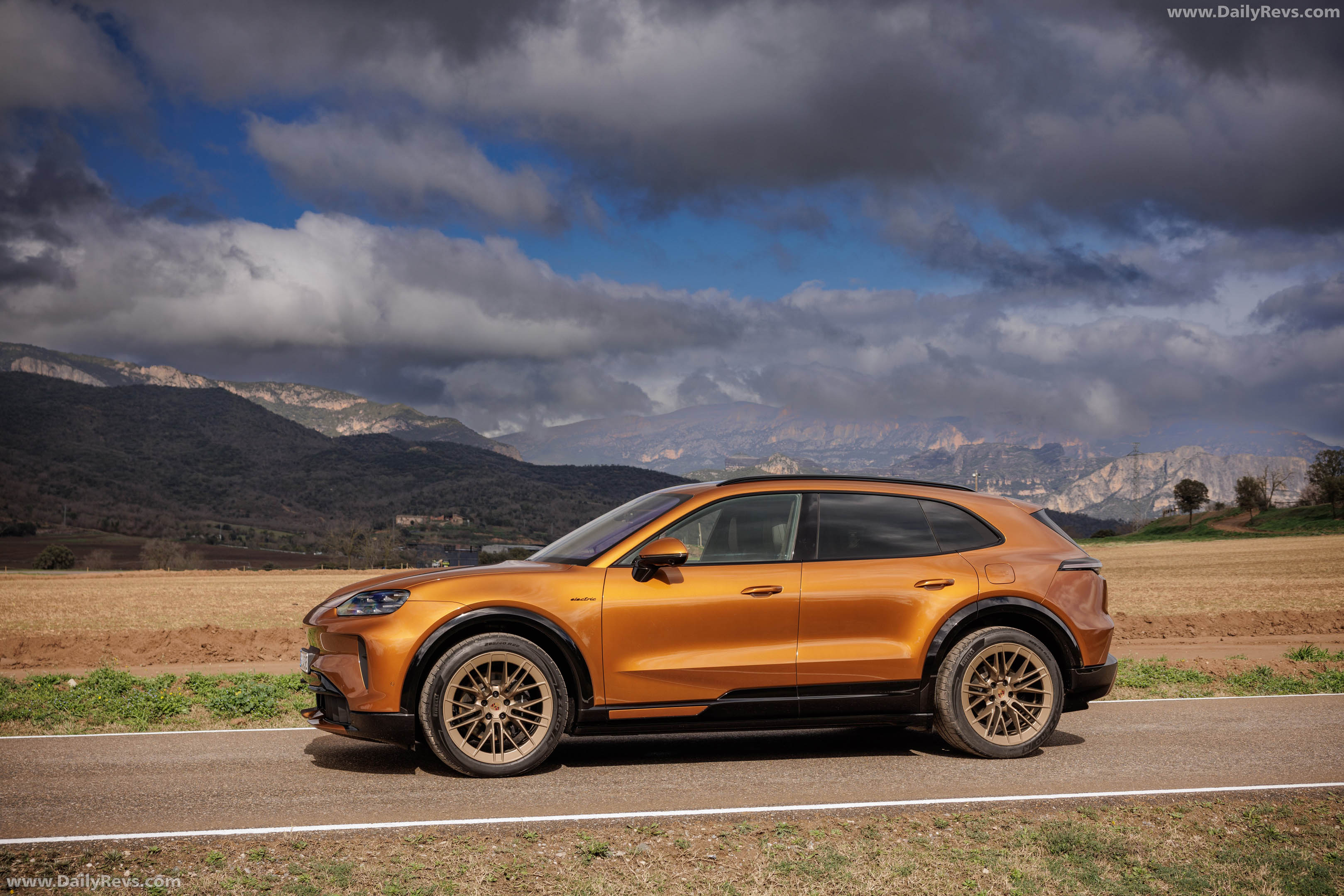 2027 Porsche Cayenne Electric E4 Madeira Gold Side View