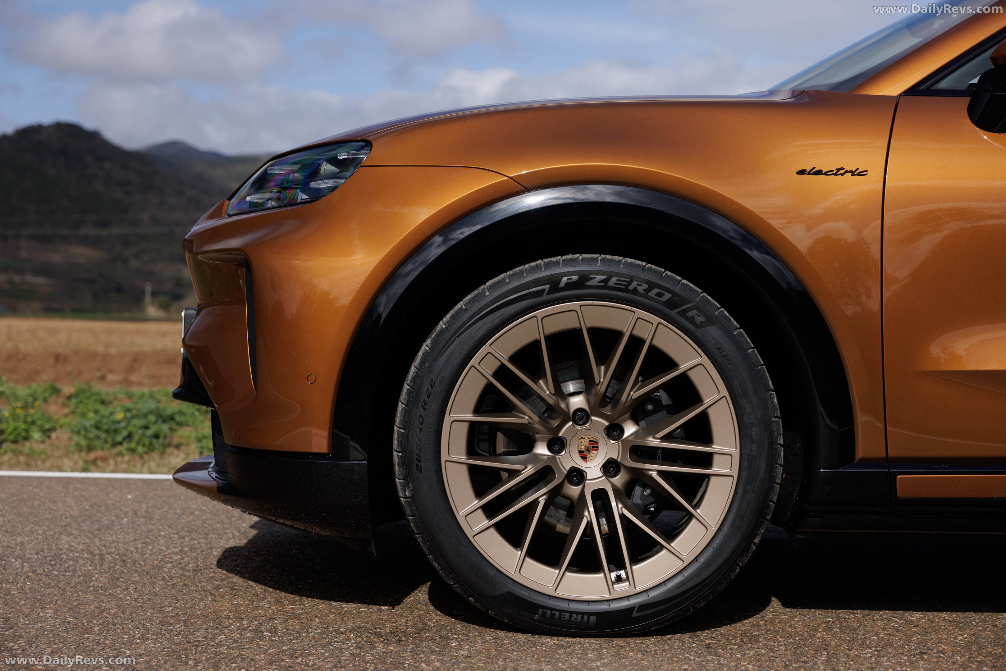 2027 Porsche Cayenne Electric E4 Madeira Gold Exterior