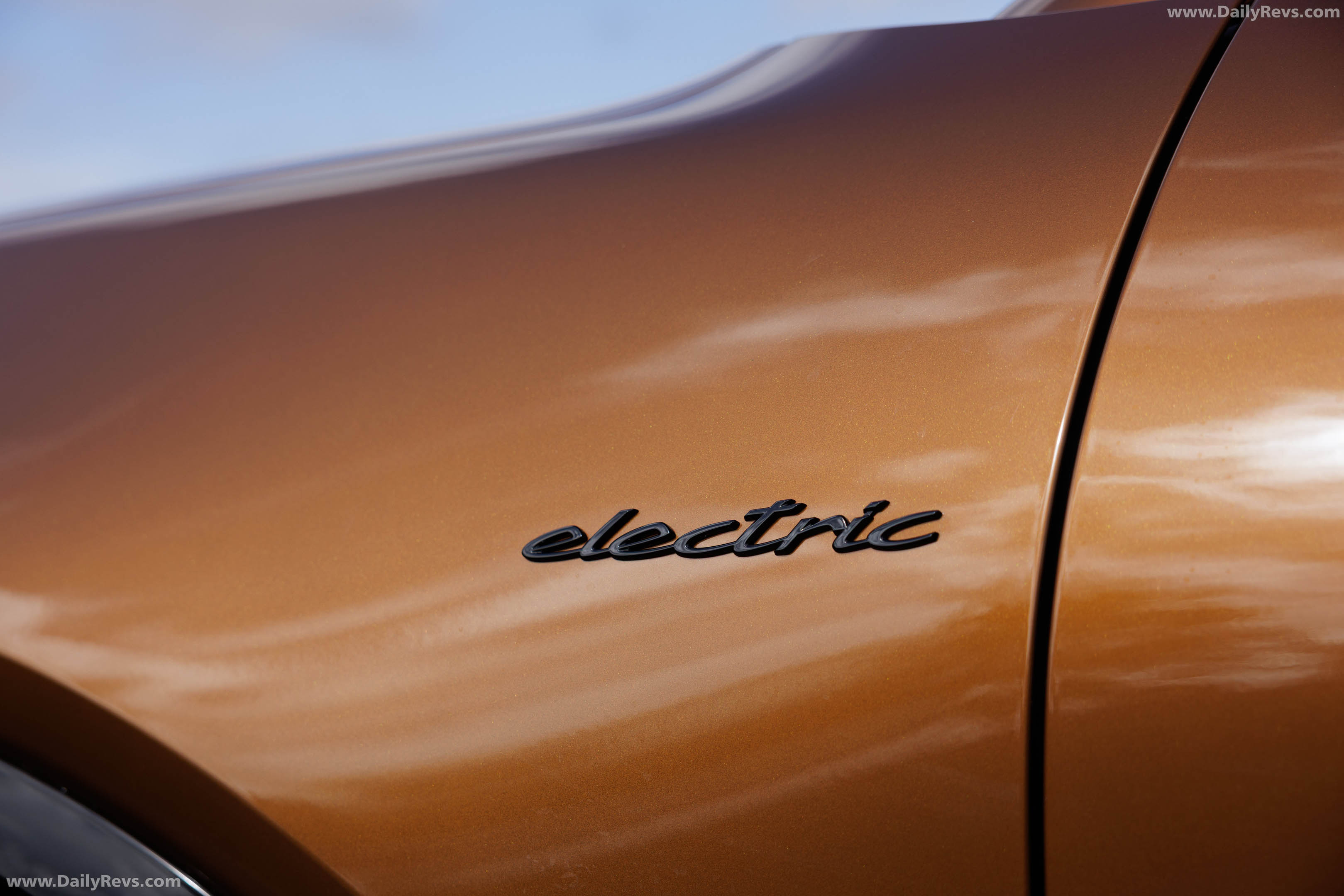 2027 Porsche Cayenne Electric E4 Madeira Gold Exterior