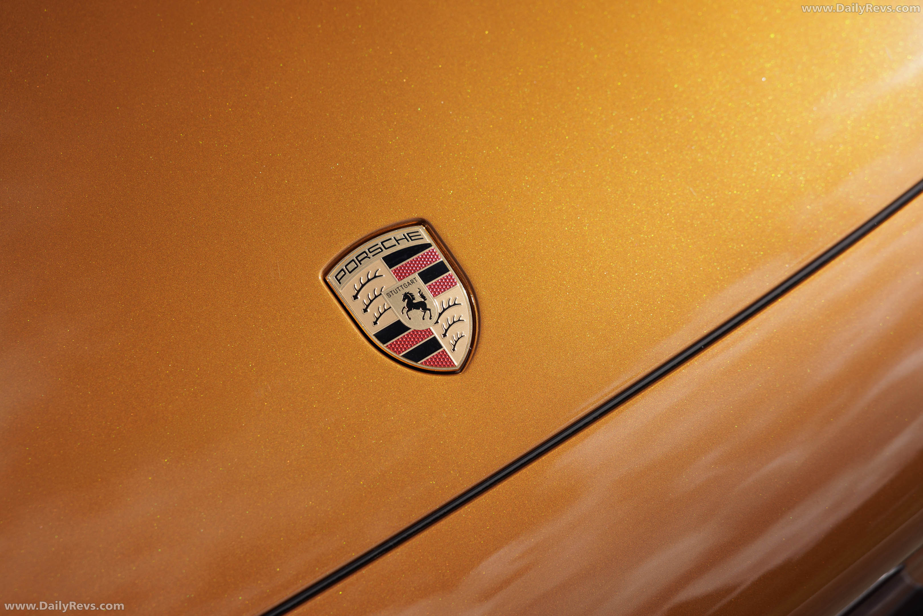 2027 Porsche Cayenne Electric E4 Madeira Gold Exterior