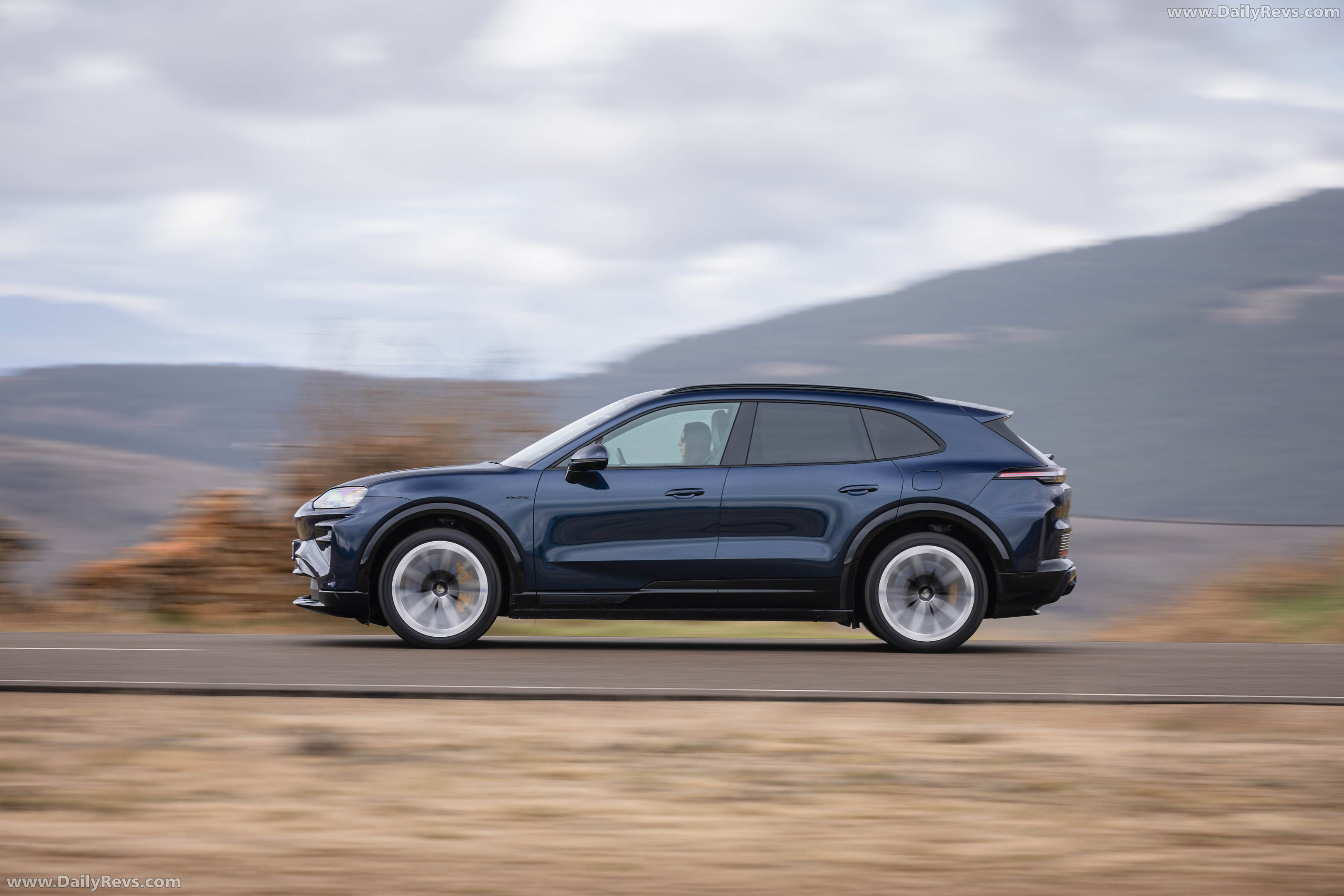 2027 Porsche Cayenne Turbo Electric E4 Algarve Blue Side View