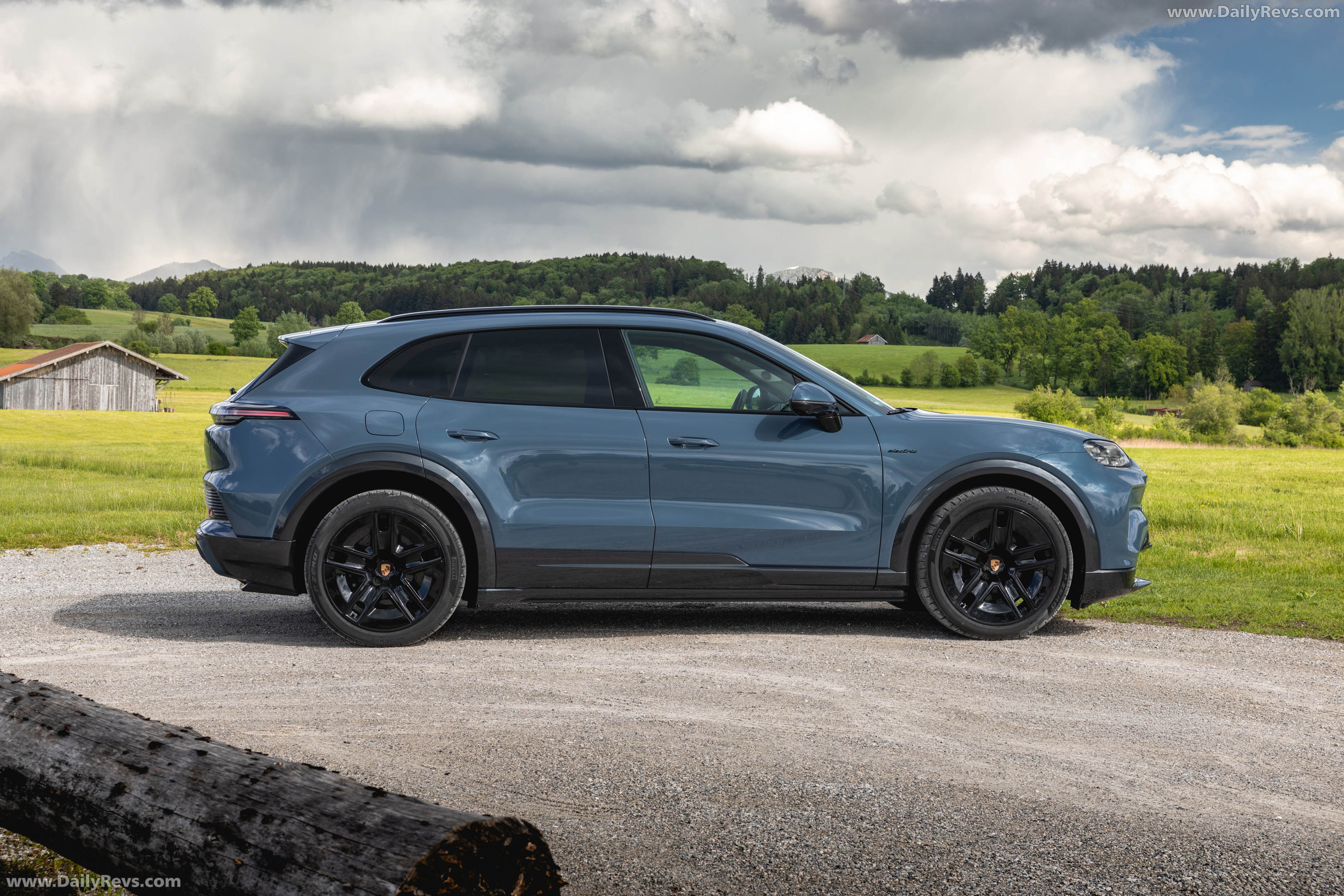 2027 Porsche Cayenne S Electric E4 Pale Blue Side View