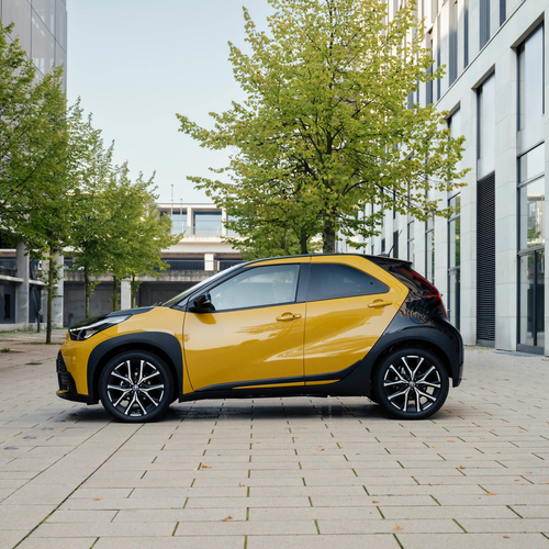 2026 Toyota Aygo X Hybrid Mustard Side View