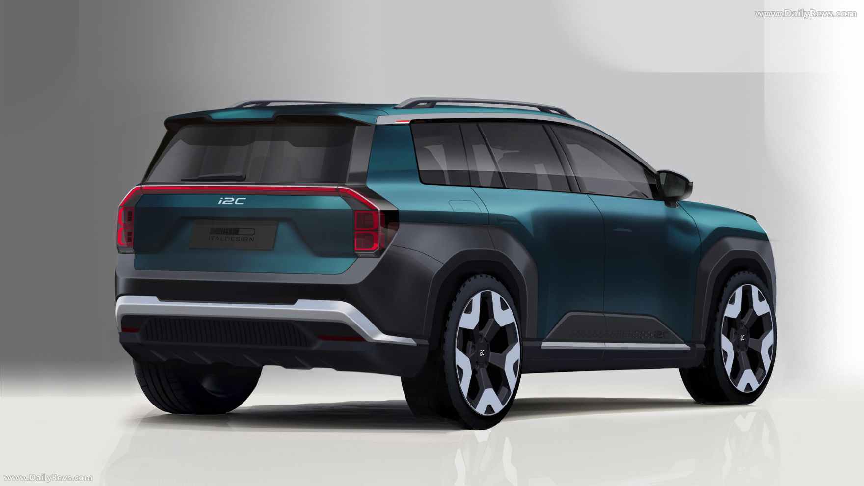 Rear three-quarter view of the i2C electric SUV showing LED tail light design